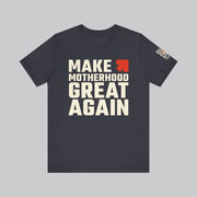 Image of heather navy color t shirt with saying "make motherhood great again" in white text with REDGlare arrow logo celebrating motherhood and not wokeness