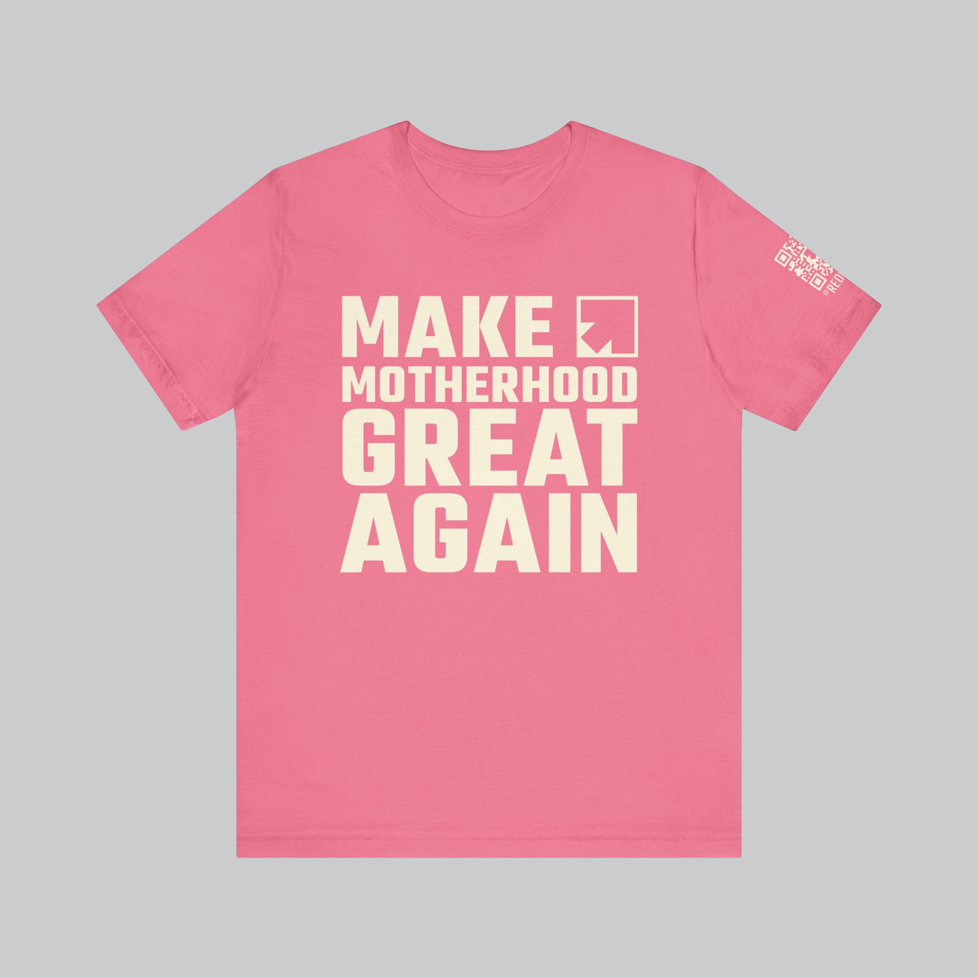 Image of pink t shirt with saying "make motherhood great again" in white text with REDGlare arrow logo celebrating motherhood and not wokeness